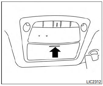To open the sunglasses holder, push and release.
