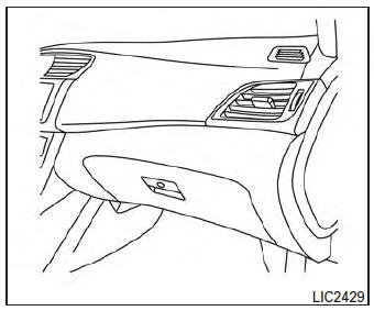 Open the glove box by pulling the handle.